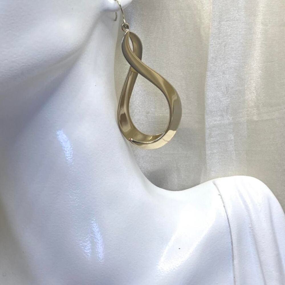 Vintage 80s gold tone infinity Loop Dangle Earrings Sculptural Teardrop